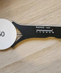 Slick Sliding Radius Gauge With A Solid Ergonomic Grip And Dang Accurate Engraved Scale For Quick Drafting And Hardwood Joinery Projects Plus Rustproof Finish For Daily Shop Grind, showing 50mm measurement.
