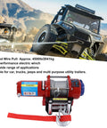 Heavy Duty 4500lb Electric Winch Kit with Roller Fairlead and Remote Control for Trucks Trailers SUVs shown in off-road setting.