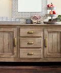 Wooden sideboard with antique brass zinc alloy cup drawer pulls set of 6 for kitchen cabinets, 5 inch hole center, installed view.