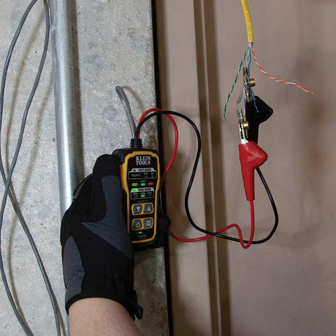 Hand using Pro Grade Wire Tracer Tone Generator Kit for Ethernet, Telephone, Speaker, Coax, Video And Data Cables with Probe