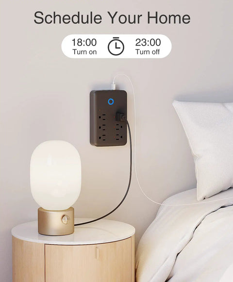No Fuss Smart Power Strip With USB Surge Protection And Wall Adapter plugged by bedside lamp