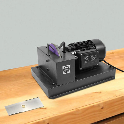 Heavy Duty Bench Mount Lawn Mower Blade Sharpener with Seven Inch Ceramic Grinding Wheel on workbench.