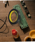 Light Shielding Tape Blackout Tape For Monitors And Windows on wooden desk with electronic components