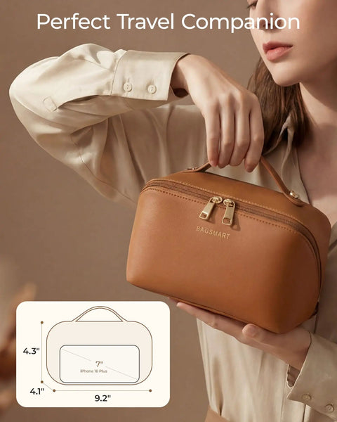 Woman holding Go To Large Makeup Bag Travel Cosmetic Organizer In PU Leather Flat Open Toiletry Case For Women Wide Opening Pouch