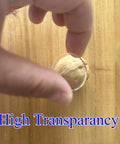 Hand holding an Extra Soft Clear Glass Table Top Bumpers Nonadhesive Antislip Polyurethane Spacer on wooden surface.