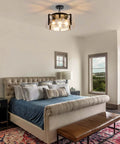 Get The Low On This Badass Matte Black 4 Light Adjustable Chandelier With Metal Frame To Drop Some Serious Glow Over Dining Tables Kitchen Islands Bedrooms Or Bathrooms Today. Over a cozy bedroom.