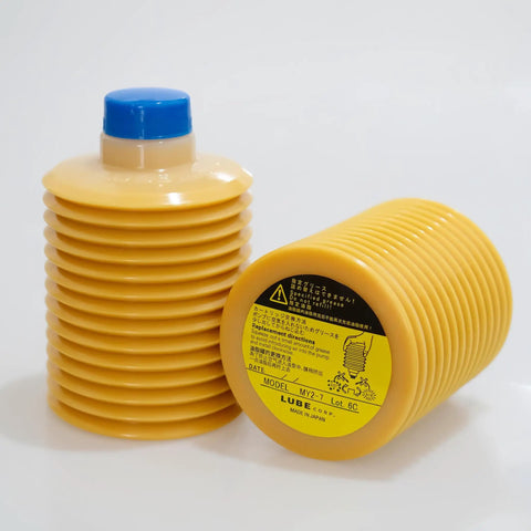 MY2-7 Cartridge Grease 700cc For Sumitomo Injection Molding Machines, yellow container with blue cap and label