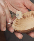 Heavy Duty Wool Felt Polishing Buffing Wheel Kit With Mandrel For Drill And Rotary Tool in use on wooden bowl.