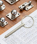 Get These Xuanqiu Quick Release Pins for Furniture And Marine Gear! This 10Pc M6 Ball Lock Set features shiny alloy pins and bases on wood.