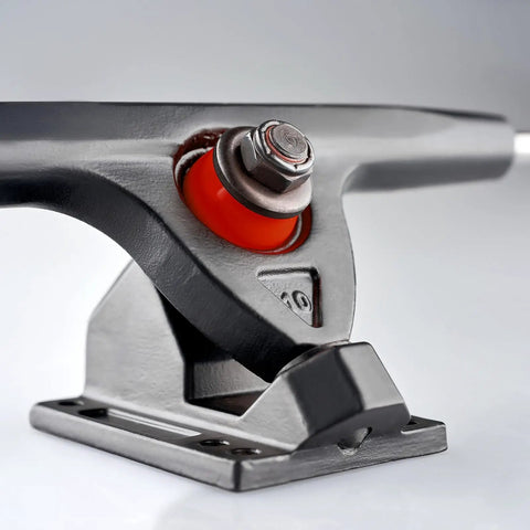 Close-up of metal truck with orange bushing from Skateboard Bushing Kit 10 Pack 90A PU Longboard Truck Bushing Rebuild Set.