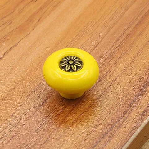 Dang Solid Vintage Ceramic Cabinet Knobs And Drawer Pulls 8 Pack Petal Design Zinc Alloy Back Plate Hardware For Kitchen Wardrobe With Easy Peasy Install, yellow ceramic knob on wood background.