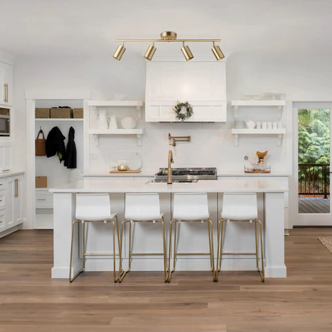 Pratt 4 Light Track Lighting In Matte Brass Gold With Pivoting Heads For Modern Glam Illumination Flexible Directional Lighting In Living Rooms Kitchens And Hallways above a kitchen island
