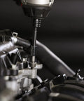 Turbo Socket Set For Damaged Bolt Extraction in use on an engine component, demonstrating effectiveness in automotive repairs.