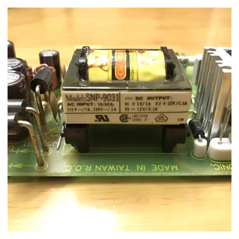 Industrial Medical Power Supply With Multi Rail Outputs 5V 2A, 12V 1.5A, Minus 12V 0.3A, Built Tough With Quiet Cooling Fan, Porous Metal Shell For Superior Heat Dissipation, Wide Input Range, Stable, Safe, No Fuss, close-up PCB transformer