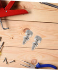 Heavy Duty Stainless Steel Retractable Spring Plunger Locking Pins For Rolling Toolboxes And Shop Cabinets Features Knurled Grip And No Sweat Adjust For Reliable Safety Latch Performance on wooden surface with tools.
