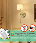 Slick Cordless Wall Sconces Set Of Two Packing All Day 10000 Mah Battery Life And Rgb Color Shift Lighting on wall with gold finish.