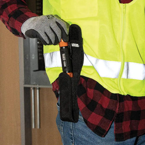 Person inserting Rechargeable 3 In 1 LED Flashlight With Spotlight Floodlight And Red LEDs 1000 Lumens USB Cable Included into holster on belt.