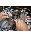 Mechanic using Three-Eighths Inch 120XP Flex-Head Teardrop Ratchet With Dual-Material Handle for engine work