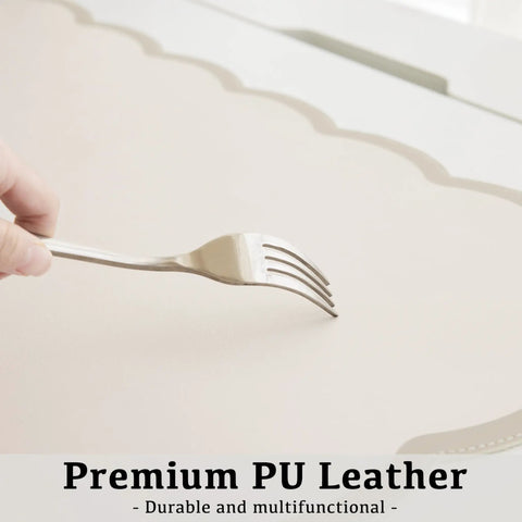Stylish Scallop Edge Desk Mat Crafted From Smooth Faux Leather Blend With No Sweat Cleanup, showcasing the beige PU leather under a fork.