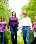 Family walking in forest wearing 6 Pack Nylon Belts For Men And Women With Plastic Buckles, Metal Free Tactical Belts