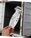 Tough As Nails Heavy Duty Replacement Door Hinge For Trucks And Trailers cold resistant metal hinge held near trailer door.