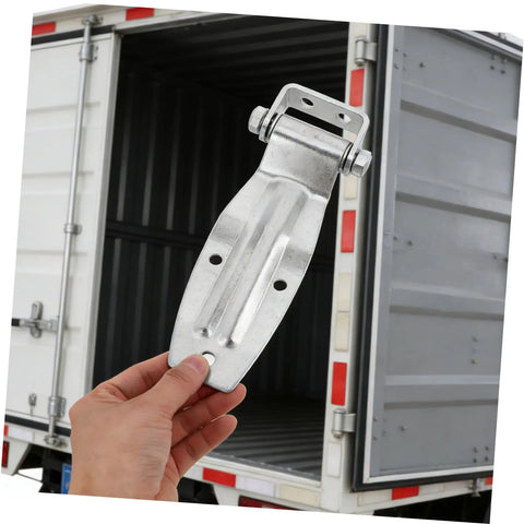 Tough As Nails Heavy Duty Replacement Door Hinge For Trucks And Trailers cold resistant metal hinge held near trailer door.