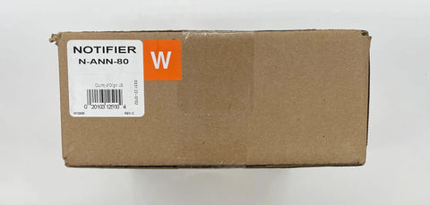 Brown box labeled NOTIFIER N-ANN-80 for Rock Solid Compact Remote Fire Annunciator featuring a bright backlit LCD display.