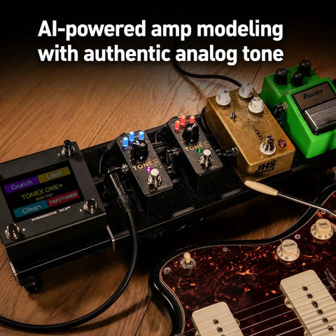 Tonex One Plus AI Guitar Amp And Effects Pedal setup on wooden surface with multiple pedals