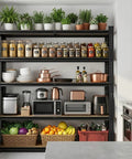 Beefy 5 Tier Garage Shelving System With Adjustable Spacing And 2000 Lbs Total Capacity 500 Lbs Per Shelf 72 Inch High 36 Inch Wide 16 Inch Deep Heavy Duty Storage For Tools Boxes And Gear. Black metal shelving in kitchen with jars, cookware, and appliances.