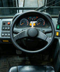 Heavy Duty Forklift Fork Locating Pins Set Secures 3 Ton Industrial Trucks To Stop Drift view from operator seat showing controls and steering wheel