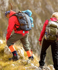 Two hikers wearing backpacks with gear including Scuba Dive Signal Light For Night Dives, High Visibility Underwater Marker Beacon