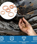 30 Pack Copper Crush Washers M14 Metric Sealing Rings under automotive oil pan, showing installation and sealing. Hands are dirty with oil.