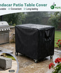 Heavy Duty Waterproof Outdoor Grill Table Cover For Feasto Gas Grill Table And Bar Cart protects against dust sun rain and water while fitting 36 inch long by 24 inch wide by 36 inch high black, shown on a patio in the rain.