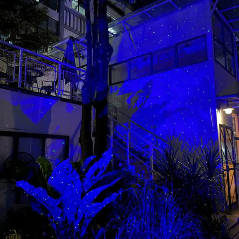 Firefly Garden Lights Star Projector With Yellow Green Laser Fireflies And Blue Nebula Cloud Outdoor Yard Decor For Lawns And Courtyard Creates Dreamy Night Sky Show For Holidays And Everyday Ambience illuminating a garden