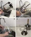 Cleaning a Kickin Smooth Electric Coffee Roaster with stainless steel drum and quartz glass window under running water.