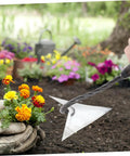 Beast Triangle Garden Hoe Tool for Digging and Manuring Sturdy Pointed Hoe Head near colorful flowers in garden
