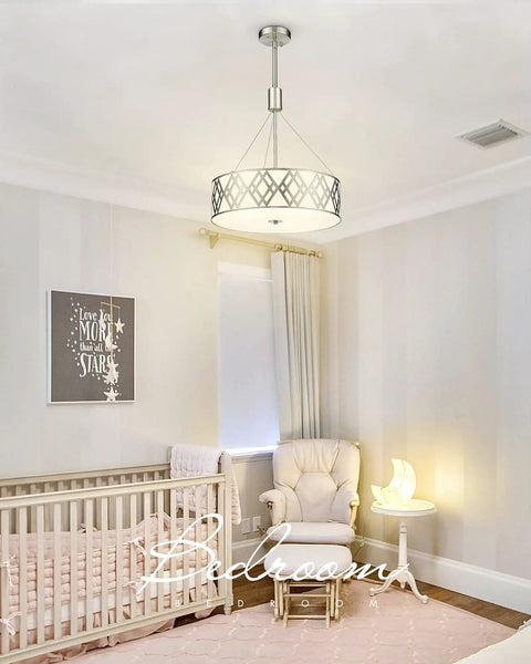 18 Inch Three Light Drum Chandelier Pendant Light With Adjustable Height In Brushed Nickel Finish in bedroom setting