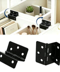 Heavy Duty Tri Fold Hinges For Cabinet Makeover installed in organizer with books and makeup brushes, showcasing black metal design.