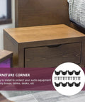Iron Corner Guard Protector With Black Finish For Furniture And Speakers on a wooden drawer setup