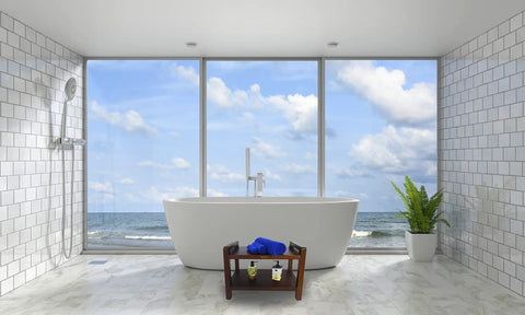 Spacious bathroom with ocean view featuring a freestanding tub and plant, with space for a Teak Shower Bench With Shelf And LiftAide Arms.