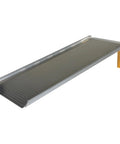 800 Lb Capacity Aluminum Dock Board For Hand Trucks Lightweight Bridge Plate With Beveled Edges Skid Proof Tread Locking Legs shown from the side.