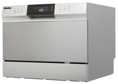 Total Game Changer Compact Countertop Dishwasher In Brushed Stainless Steel With Quick Connect Faucet Setup For Six Place Settings And Clean Dishes In A Snap Featuring Energy Efficient Eco Mode, modern design with digital controls.