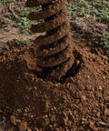 9 Inch Auger Bit For 3 Point Post Hole Digger With Fishtail Point digging into soil, visible steel spiral, bolt on safety cover visible