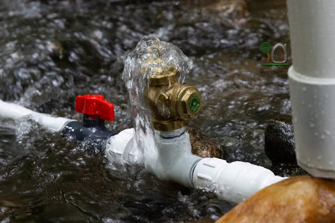 Tiny Half Inch Hydraulic Ram Pump For Off Grid Water Delivery From Creeks And Streams No Fuel Or Electricity Needed PVC Body With Lead Free Brass Waste Valve Ideal DIY Rural Water Pump in creek