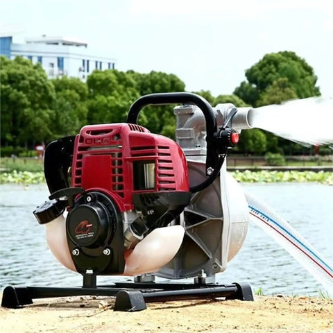 Heavy Duty Gasoline Mini Water Pump With High Lift Design And One Inch Port for efficient yard irrigation by a water body.