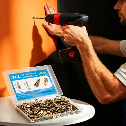 DIYer using All In One 180 Piece Self Drilling Drywall Anchors Kit With 90 Winged Anchors And 90 Screws For Gypsum Board Sheetrock And Hollow Walls No Pre Drill Required Fast Easy Mount In Seconds For Any Diyer on orange wall.