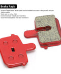 Two red semi-metallic disc brake pads for mountain and electric bikes, highlighting heat resistance and durability.