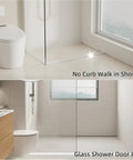 No curb walk shower design showing sleek glass wall, modern tiles, and efficient water barrier in bathroom.
