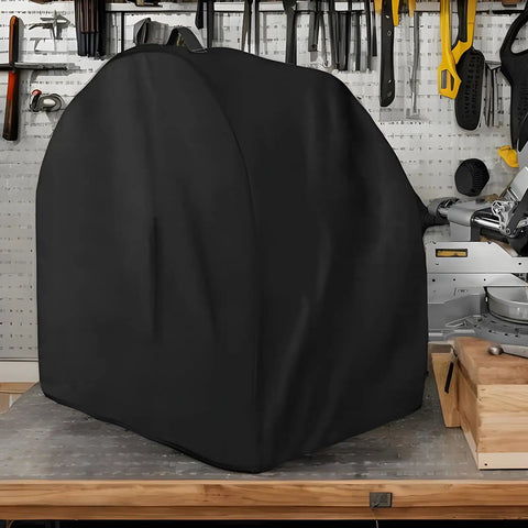 Heavy Duty Miter Saw Cover Waterproof Dust Shield Top Shelf Shop Bag, durable black cover on a workbench in a garage.