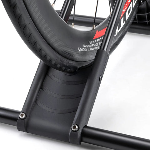 Close-up of bike tire on Freestanding Bike Floor Stand For Garage And Home Indoor Bicycle Rack That Fits 20 To 29 Inch Mountain And Road Bikes